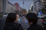 Lidé na ulici v Pekingu