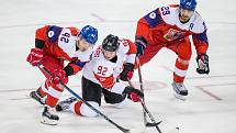 Čeští hokejisté (v červeném) proti Kanadě v bitvě o bronz na olympijských hrách v Pchjongčchangu.