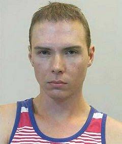 Kanibalský vrah Luka Magnotta přezdívaný Googling na policejním identifikačním snímku v roce 2012