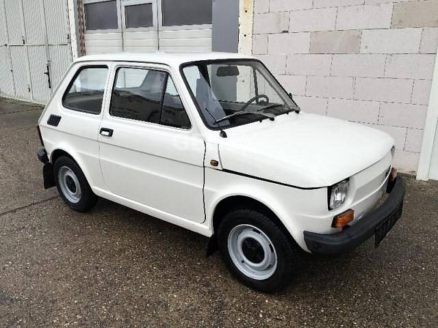 Polski Fiat 126p (1985). Najeto: 19 500 km. Cena: 7900 eur (213 477 Kč).