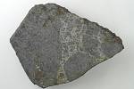 Úlomek z ensisheimského meteoritu při výstavě ve Freiburském přírodním muzeu v Bádensku-Württembersku