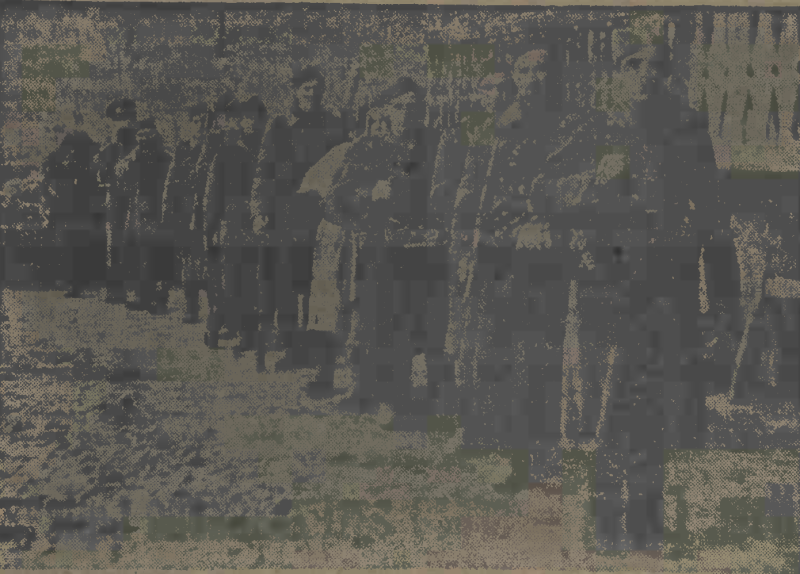 Členové slovenské partyzánské skupiny na snímku v novinách vydaných v létě 1945