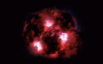 Vizualizace tajemné galaxie: Výbuchy nově vytvořených hvězd nasvěcují oblaka plynu a prachu, která ji obklopují