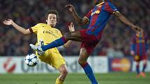 Tomáš Rosický (vlevo) ještě v dresu Arsenalu a Eric Abidal z Barcelony.