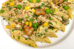 Penne with cheese sauce, chicken and vegetables