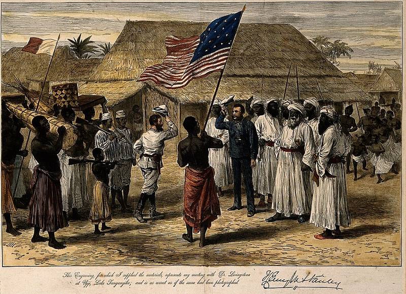 Henry Morton Stanley se setkal s Davidem Livingstonem v Ujiji na území dnešní Tanzanie v Africe. Barevná dřevorytina H. Halla, asi 1880