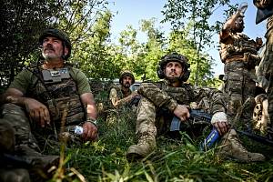 Ukrajinští vojáci během ruské invaze na Ukrajinu