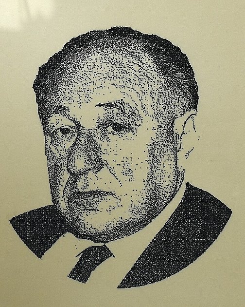 Portrét Františka Kriegla na pamětní plaketě ve Škrétově 44