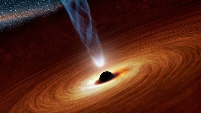 Supermasivní černá díra v nedaleké spirální galaxii NGC 1365.