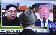 Kim Čong-un (vlevo) a Donald Trump.
