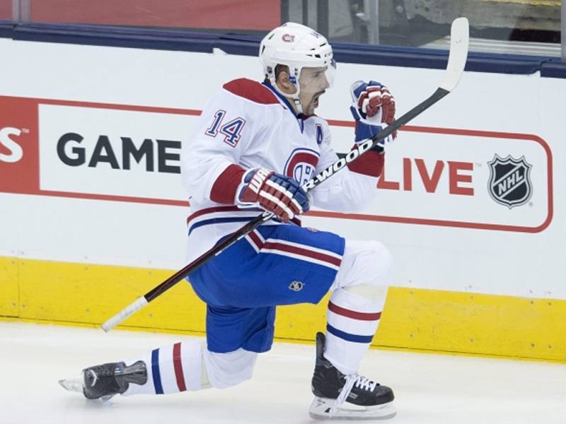 Tomáš Plekanec z Montrealu rozhodl v úvodním hracím dni nového ročníku NHL dvěma brankami o výhře nad Torontem.
