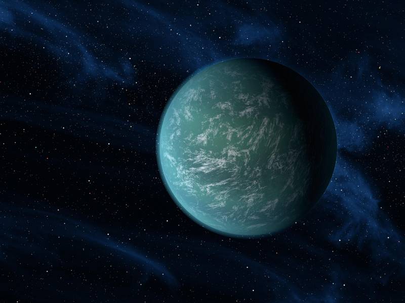 Umělá vizualizace potenciálně obyvatelné planety Kepler-22b.