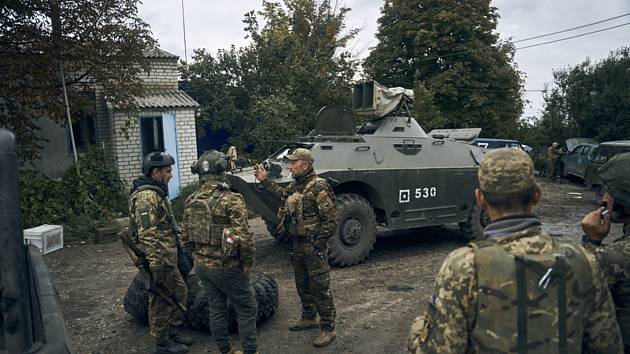 Ukrajinští vojáci v Izjumu 13. září 2022.