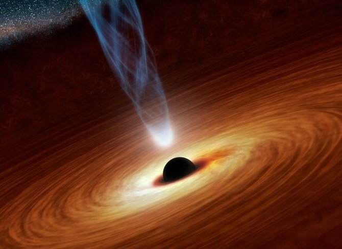Na snímku NASA supermasivní černá díra v nedaleké spirální galaxii NGC 1365.
