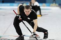 Ruský curler Alexandr Krušelnickij.