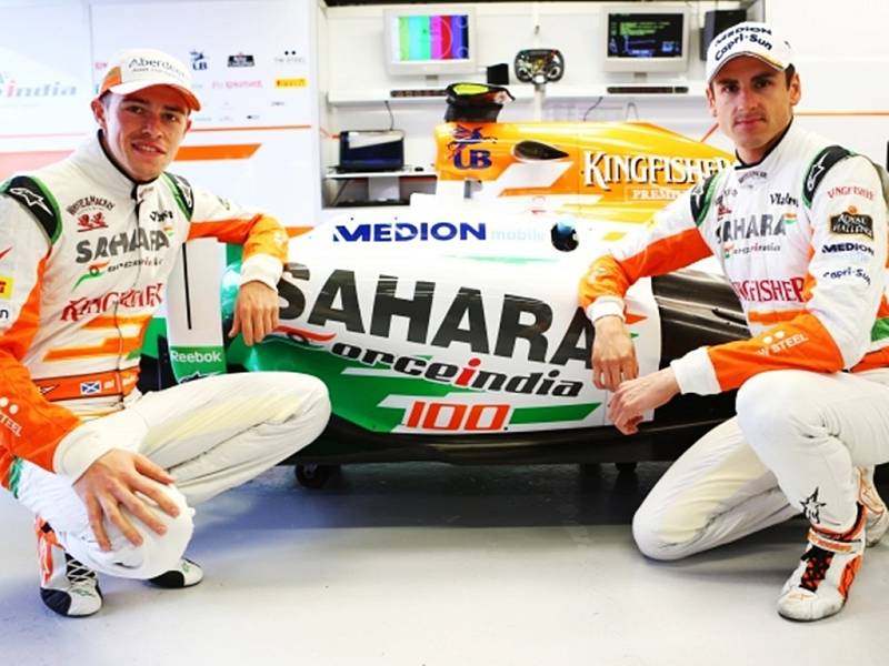 Paul di Resta (GBR) Sahara Force India F1 and Adrian Sutil (GER) 