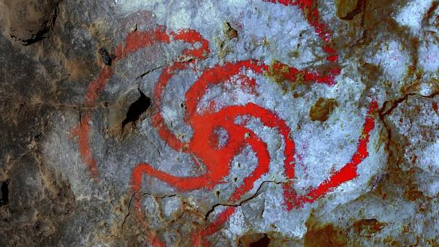 Zvýrazněná kresba symbolu větrníku nalezená v jeskyni