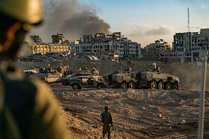 Izraelští vojáci v palestinské Gaze.