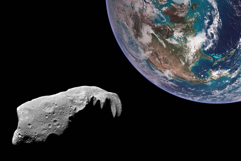 Země a asteroid - ilustrační foto.