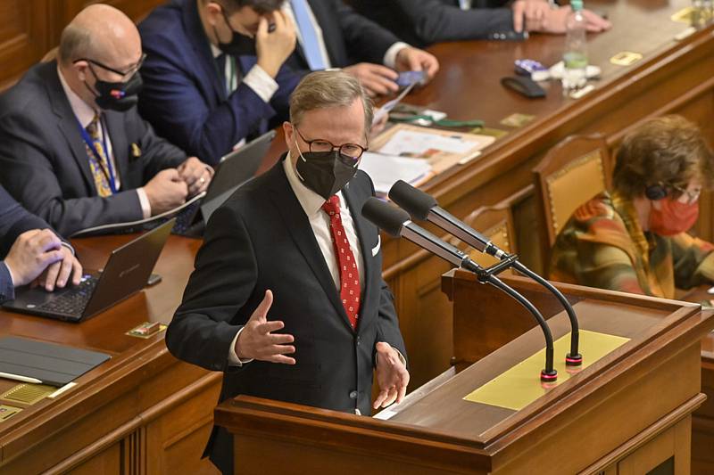Premiér Petr Fiala hovoří při jednání sněmovny o vyslovení důvěry vládě Petra Fialy, 13. ledna 2022 v Praze.