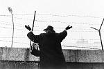 The construction of the Berlin Wall divided the lives of thousands of families in a matter of hours.  In 1961, photographer Dan Budnik captured a woman in the western sector trying to get the attention of her relatives who remained on the eastern side of the wall.