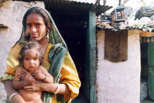 Žena ze skupiny polokočovných kovářů Gadulia Lohare, Udaipur- Radžastán (Indie), 2002. 
