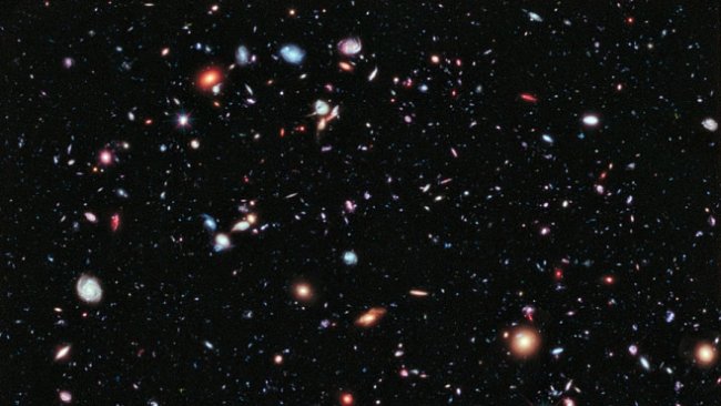 Nejvzdálenější část vesmíru je stará téměř jako on sám