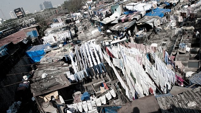 Dhobi Ghat je největší prádelna světa. A perou tam jen muži