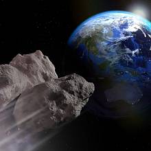 Asteroid mířící k Zemi.