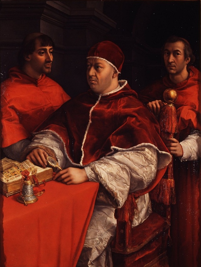 Papež Lev X. s kardinály Giuliem de Medici a Luigim de Rossi s lupou v levé ruce.