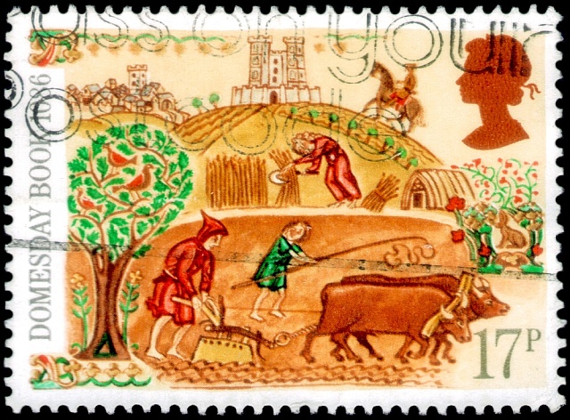Práce na poli: Poštovní známka vydaná ve Spojeném království s obrázkem rolníků.
