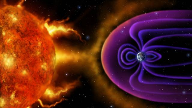 Digitální ilustrace zemské magnetosféry, která odráží sluneční vítr a záření ze Slunce.