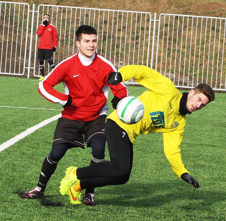 Utkání Žatce (ve žlutém) proti Spořicím