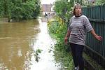 Rok 2002: záplavy v našem regionu na Chomutovce a následná humanitární pomoc od lidí z okresu Louny, proudící do celé ČR.