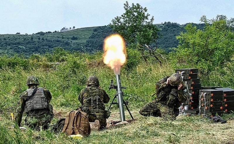 Ostré střelby minometné baterie v Doupovských horách.  