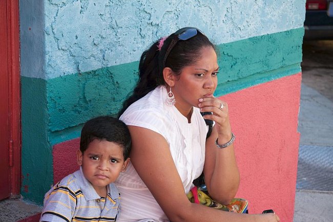 Ilustrační foto - Žena s dítětem ve Venezuele