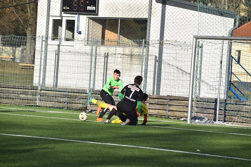 Jiskra Domažlice (žlutí) - Start Tlumačov (černí) 12:2, 4. února 2023.