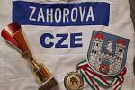Pohár a medaile judistky Jaroslavy Záhořové z mezinárodního mistrovství v maďarském Györu. 