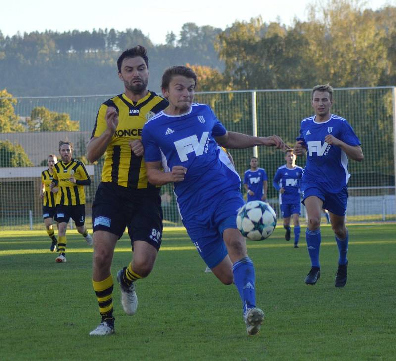 David Vitebský (na archivním snímku v modrém) se o víkendu zaskvěl parádním gólem.