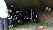 Sbory dobrovolných hasičů z Karlovarského kraje nacvičovaly v autocampu Luxor u Drmoulu záchranu osob při živelních katastrofách. 