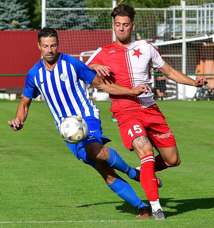 Karlovarská Slavia sice vedla v derby nad Ostrovem již 2:0, přesto nakonec uhrála pouze nerozhodný výsledek 2:2.