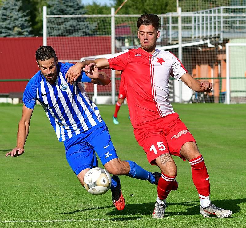 Karlovarská Slavia sice vedla v derby nad Ostrovem již 2:0, přesto nakonec uhrála pouze nerozhodný výsledek 2:2.