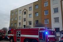 Požár bytu v Benešově.
