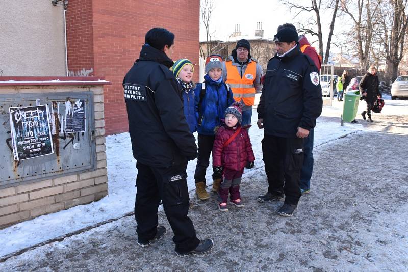 Asistenti prevence kriminality v ulicích Slaného