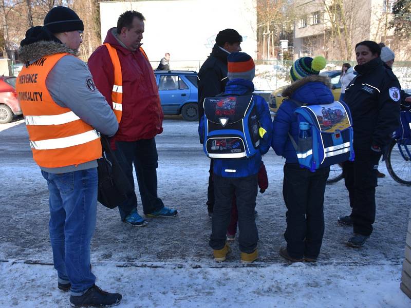 Asistenti prevence kriminality v ulicích Slaného