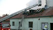 Požár rodinného domu v Libušíně.