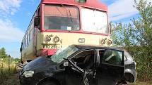Střet vlaku a osobního auta v Klatovech.