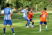 Letní příprava: SK Rapid Psáry (na snímku fotbalisté v oranžových dresech) - SK Union Vršovice (pruhovaní) 3:0 (1:0).
