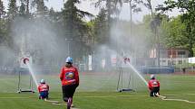 Z hasičské soutěže na atletickém stadionu M. Tučka v Kolíně.