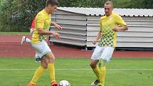 Jindřichohradečtí fotbalisté (ve žlutém) vstoupili do nového ročníku divize s výraznými změnami v kádru.